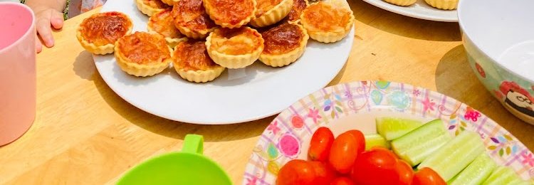 Table with pastries, fruit and vegetables — meals at Limpopo kindergarten